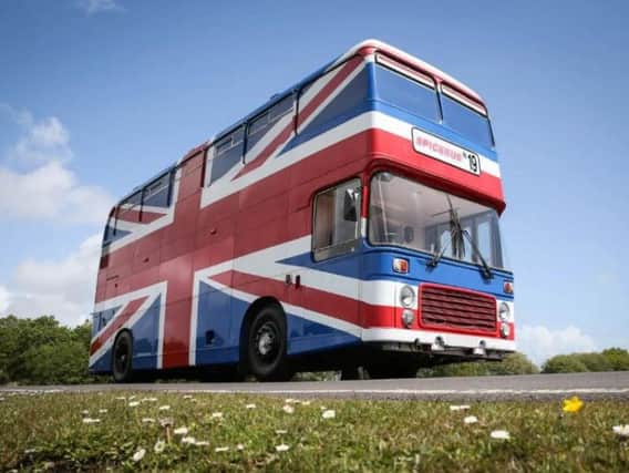 Die-hard Spice Girls fans can now spend a night aboard the original Spice Bus (Photo: Airbnb)
