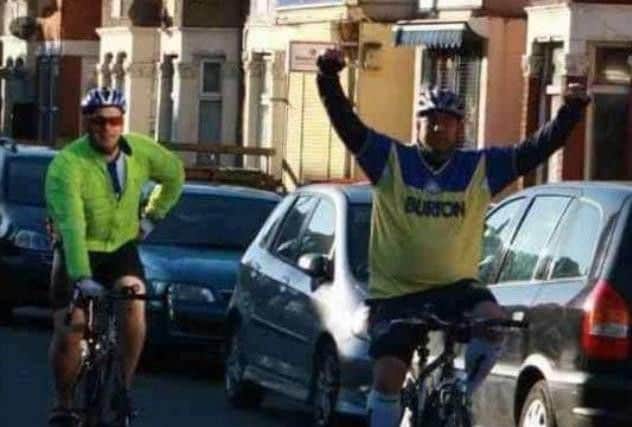 Mr Atkinson during his own cycle challenge.