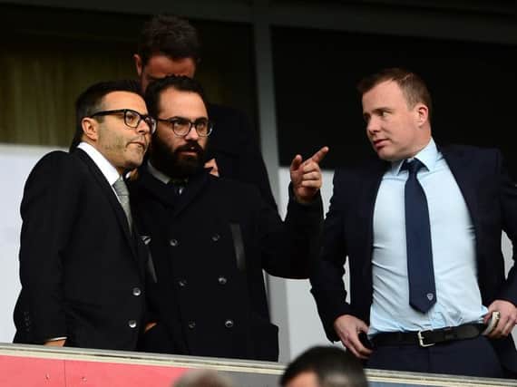 Leeds United chairman Andrea Radrizzani with Victor Orta and Angus Kinnear.