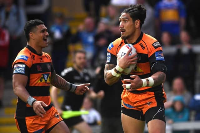 Jesse Sene-Lefao celebrates his second try against Leeds Rhinos with Peter Mata'utia.