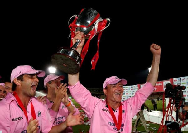 Shaun Udal celebrates victory with the trophy after Middlesex win the Twenty20 Cup Final against Kent in 2008.  Picture: Richard Heathcote/Getty Images