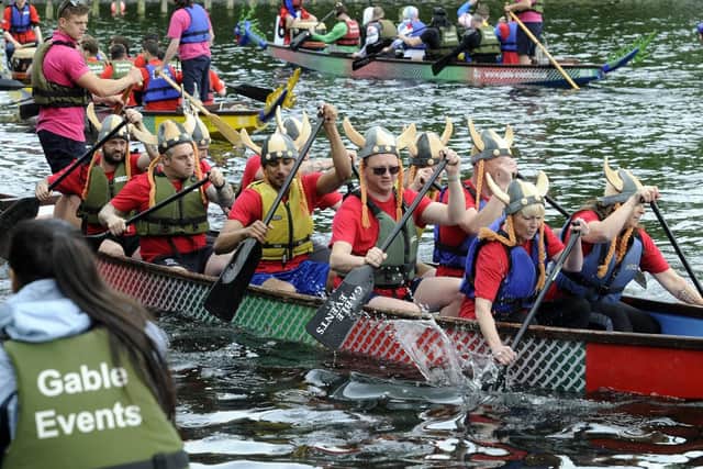 Action at a previous Dragon Boat Race on the lake at Roundhay Park.