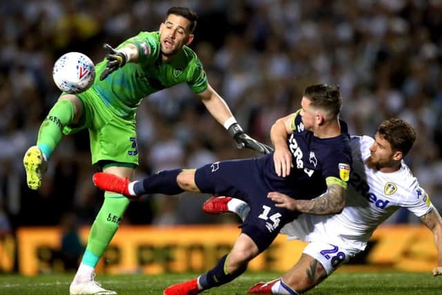 Leeds United goalkeeper Kiko Casilla flaps for the ball against Derby County at Elland Road.