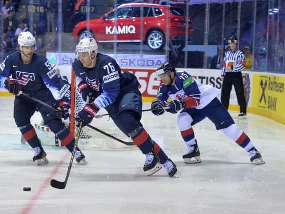 TOUGH GOING: Robert Dowd, far right, tries to stop a breakout from the USA on Wednesday in Kosice; Picture: Dean Woolley.