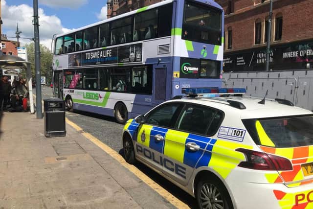 Police at the scene with the bus in New Briggate