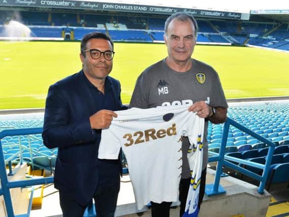 Leeds United owner Andrea Radrizzani (L) and head coach Marcelo Bielsa (R).