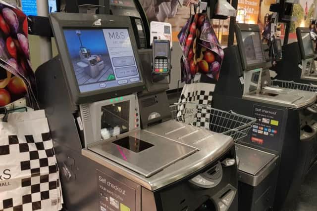 Supermarkets are being urged to introduce a 1p charge to use self-checkout machines