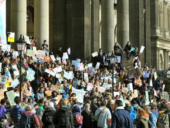 School students with their banners on the Town Hall steps in Leeds at the Youth Strike for Climate strike in March.