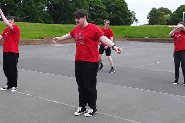 PERFORMANCE: Members of DAZL put on a street dance show at the celebration event.
