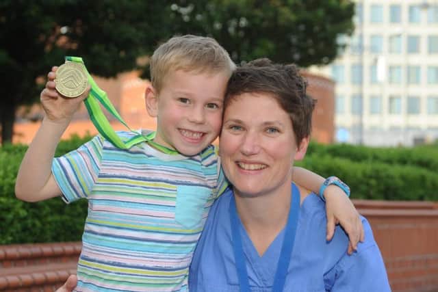 Noah Thomson, six, with proud Mum Helen, a radiographer at Leeds General Infirmary, after completing the Yorkshire Three Peaks