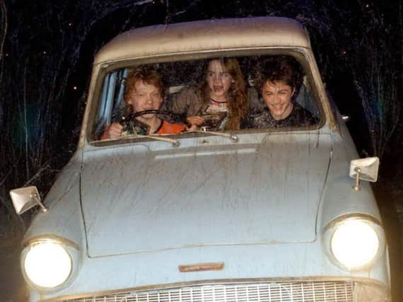 People in Leeds can sit in the Harry Potter flying car this weekend. PIC: Yui Mok/PA
