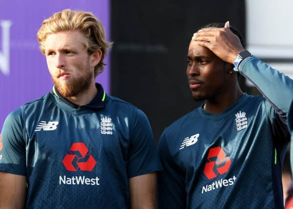 DIFFERENT DIRECTIONS: David Willey and Jofra Archer. Picture: Alex Davidson/Getty Images