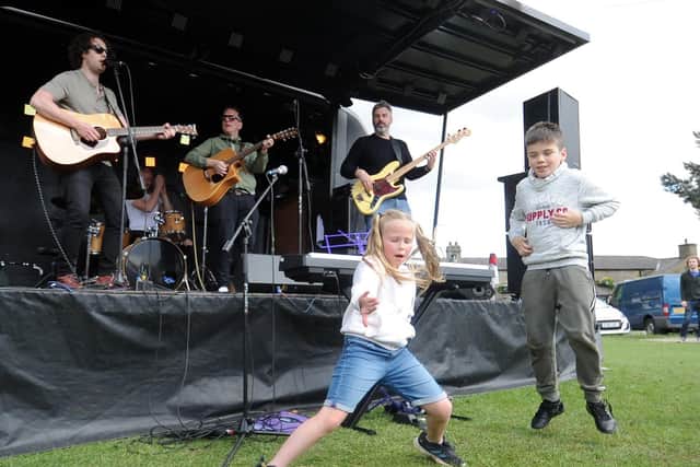 Youngsters get into the groove at Music on T'Pitch.