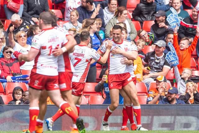 Hull KR's Craig Hall is congratulated on scoring a try against Salford. Picture: Allan McKenzie/SWpix.com