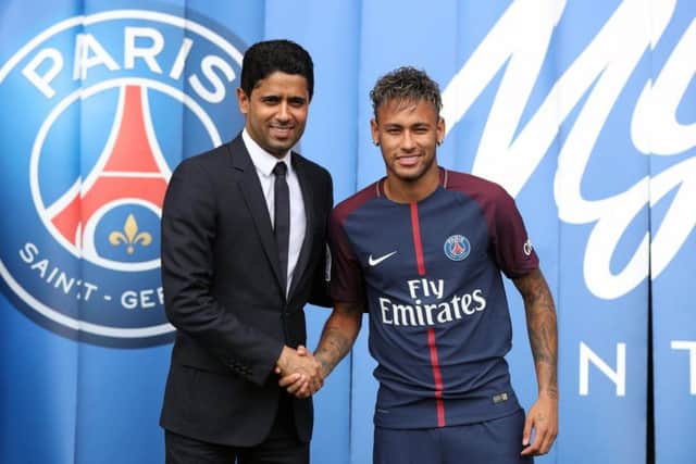 PSG chairman Nasser Al-Khelaifi, a close associate of Andrea Radrizzani's, unveils the world-record signing of Neymar in 2017.