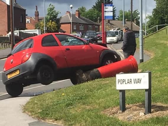 Car collides into post box in Bramley, Leeds