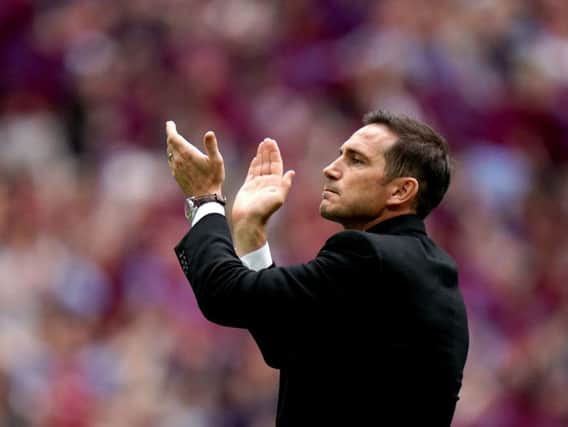 Frank Lampard applauds Derby's fans after their defeat to Aston Villa in the Championship play-off final.