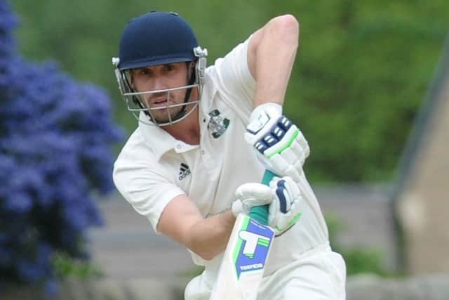 James Davies pushes a single for his 50. He scored 126 and took five wickts for Otley against Addingham. PIC: Steve Riding