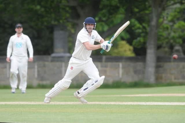 Otley's James Davies in run-getting action against visiting Addingham. PIC: Steve Riding