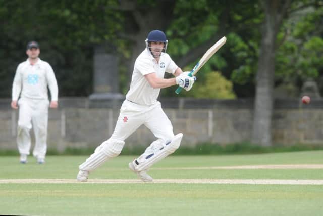 Otley's 
James Davies in run-getting action against visiting Addingham. PIC: Steve Riding