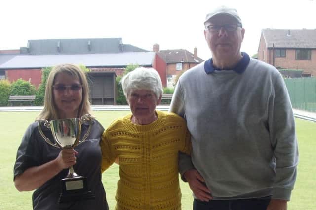 Tournament winners Mandy Wilson, left, and Jim Jordan, right.