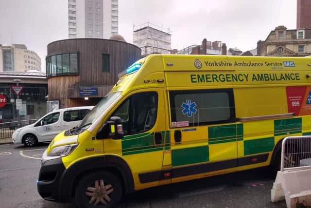 Two ambulances were parked in New Station Street.