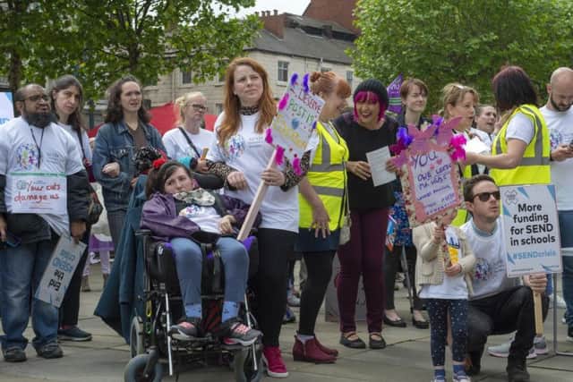 Parents' protest over funding for young people with special educational needs and disabilities outside Leeds City Art Gallery.