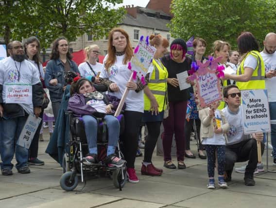 Parents' protest over funding for young people with special educational needs and disabilities outside Leeds City Art Gallery.