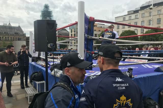 Josh Warrington before a public workout in Millennium Square. In the ring is fellow Leeds boxer Jack Bateson.