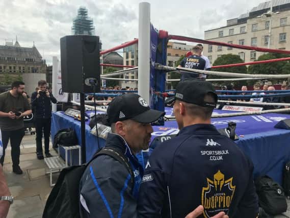 Josh Warrington before a public workout in Millennium Square. In the ring is fellow Leeds boxer Jack Bateson.