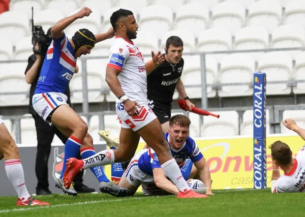 Wakefield's Jack Croft scores against St Helens.