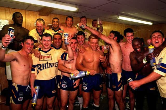 Leeds Rhinos players celebrate in the dressing room after their victory against the Adelaide Rams in the World Club Championship.