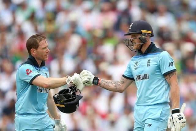 England's Eoin Morgan (left) and Ben Stokes during the ICC Cricket World Cup group stage match at The Oval. Picture: Nigel French/PA