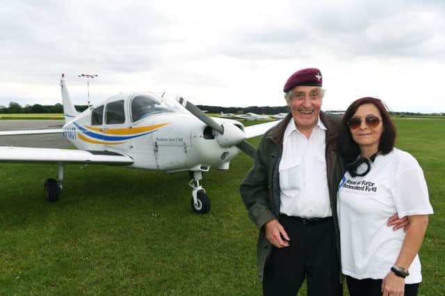 87-year-old veteran fundraiser and former paratrooper Jeffrey Long, who is learning to fly, takes pub landlady Louise Johnson, who is petrified of flying for a spin from Sherburn Aero Club.