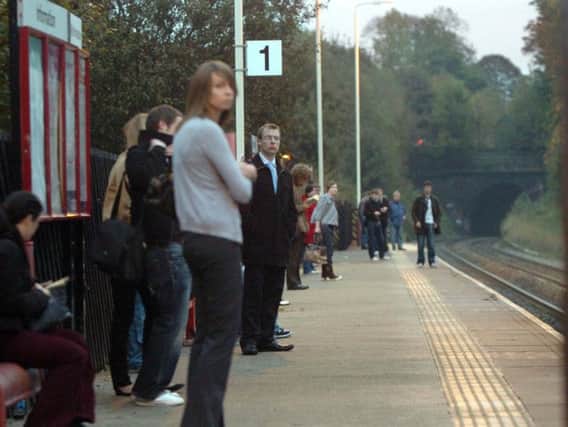 Passengers wait at Headingely station (file image).