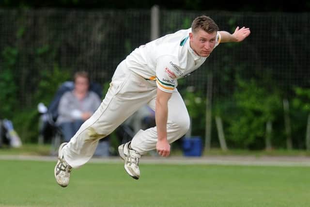 Pudsey St Lawrence bowler Richard Lamb takes flight at Woodlands. PIC: Steve Riding