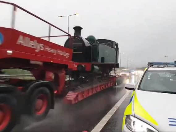 The train passing the cop on the M606.