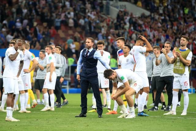 LEADING MAN: Gareth Southgate consoles his players after their World Cup semi-final defeat to Croatia. Picture: Adam Davy/PA
