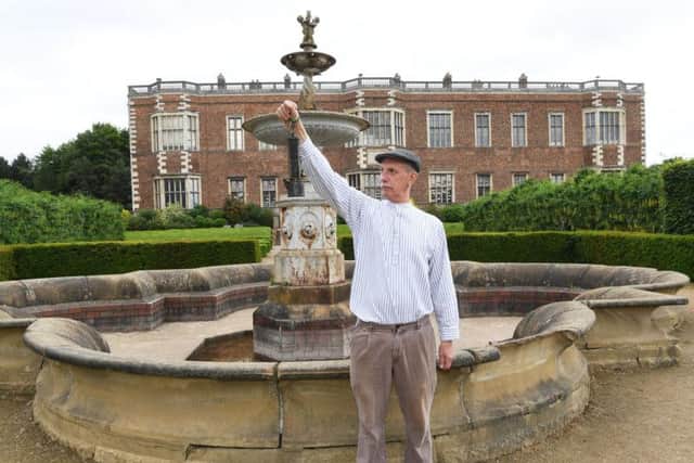 Former miners attend a talk at Blot on the Landscape, a new exhibition at Temple Newsam House in Leeds that explores the story of the estate's old Waterloo pit. Pictured Steve Wyatt dressed as a Victorian miner.
