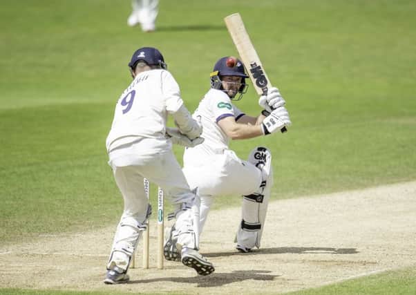 Yorkshire's Adam Lyth hits out against Essex.