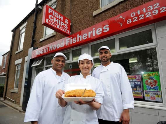 Robin Hood Fisheries, Robin Hood Wakefield, celebrating National Fish and Chip Day. Pictured from the left are Kulwant Singh Bains, Gurminder Bains and Gurdeep Singh Bains.