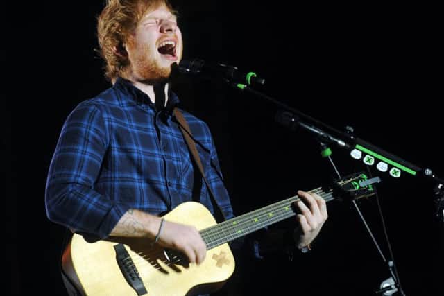 Ed Sheeran tops the list of most-played songs on the radio last year.