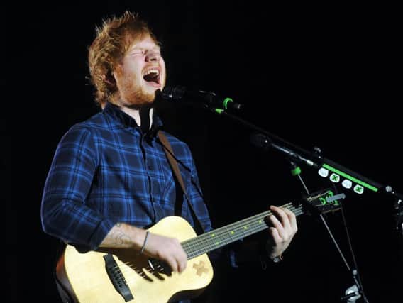 Ed Sheeran tops the list of most-played songs on the radio last year.