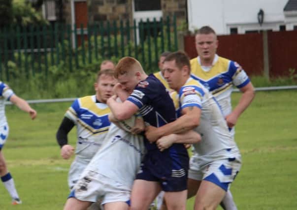 Hunslet try-scorer Dylan Naughton in action against Batley Boys. Picture submitted