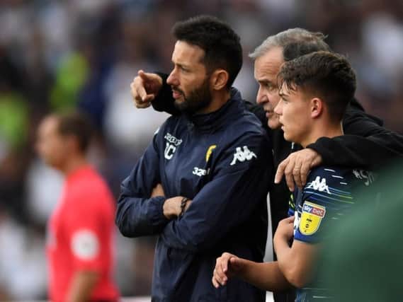 KEY INFLUENCE: Carlos Corberan and Marcelo Bielsa with Jamie Shackleton as the midfielder gets ready to make his Leeds United debut in August's 4-1 win at Derby County.