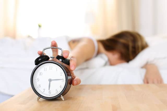 A Generic Photo of a woman being woken up early by her alarm clock. See PA Feature TOPICAL Sleep. Picture credit should read: PA Photo/thinkstockphotos. WARNING: This picture must only be used to accompany PA Feature TOPICAL Sleep.