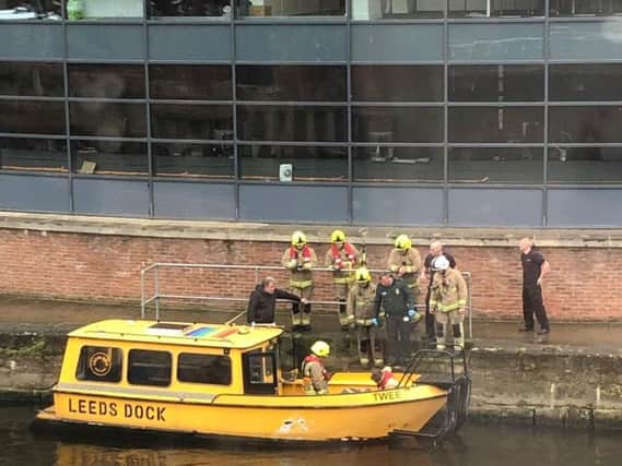 The Leeds Dock water taxi helped with the rescue (Picture: Oliver Blackburn).