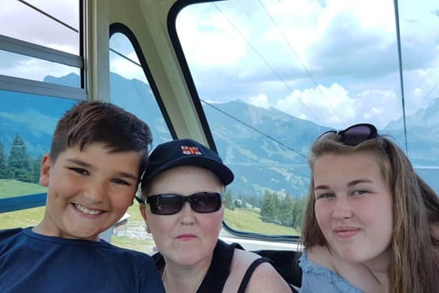 Jo Harker on holiday in Switzerland with her children Libby and Harry.