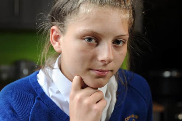 Bobbiemay Smith, 14, was sent home from Cockburn John Charles Academy in Belle Isle after teachers spotted the tiny clear, plastic earring.