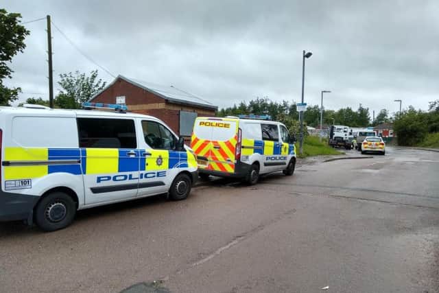 Five police vehicles were still at the scene at midday.